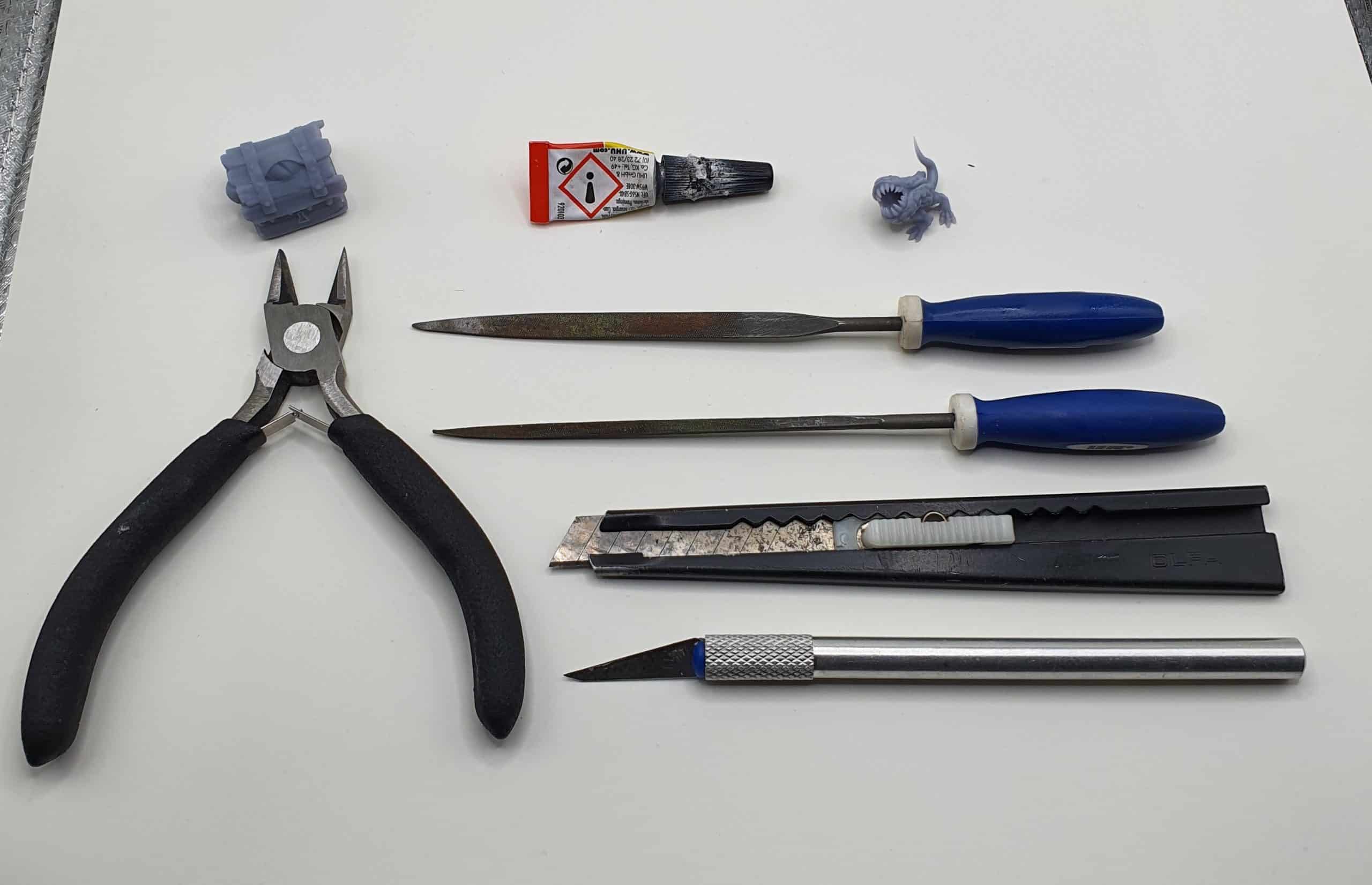 A Selection of 3D Printing tools for post processing. Clippers, files, a knife and the all important glue.